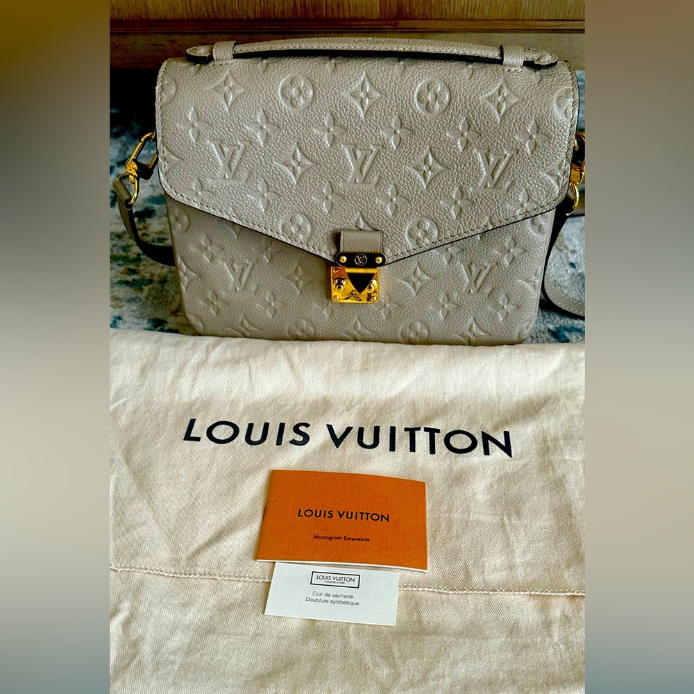 Pochette Métis in excellent condition